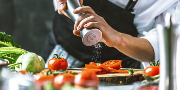 Chef,Cook,Preparing,Vegetables,In,His,Kitchen.